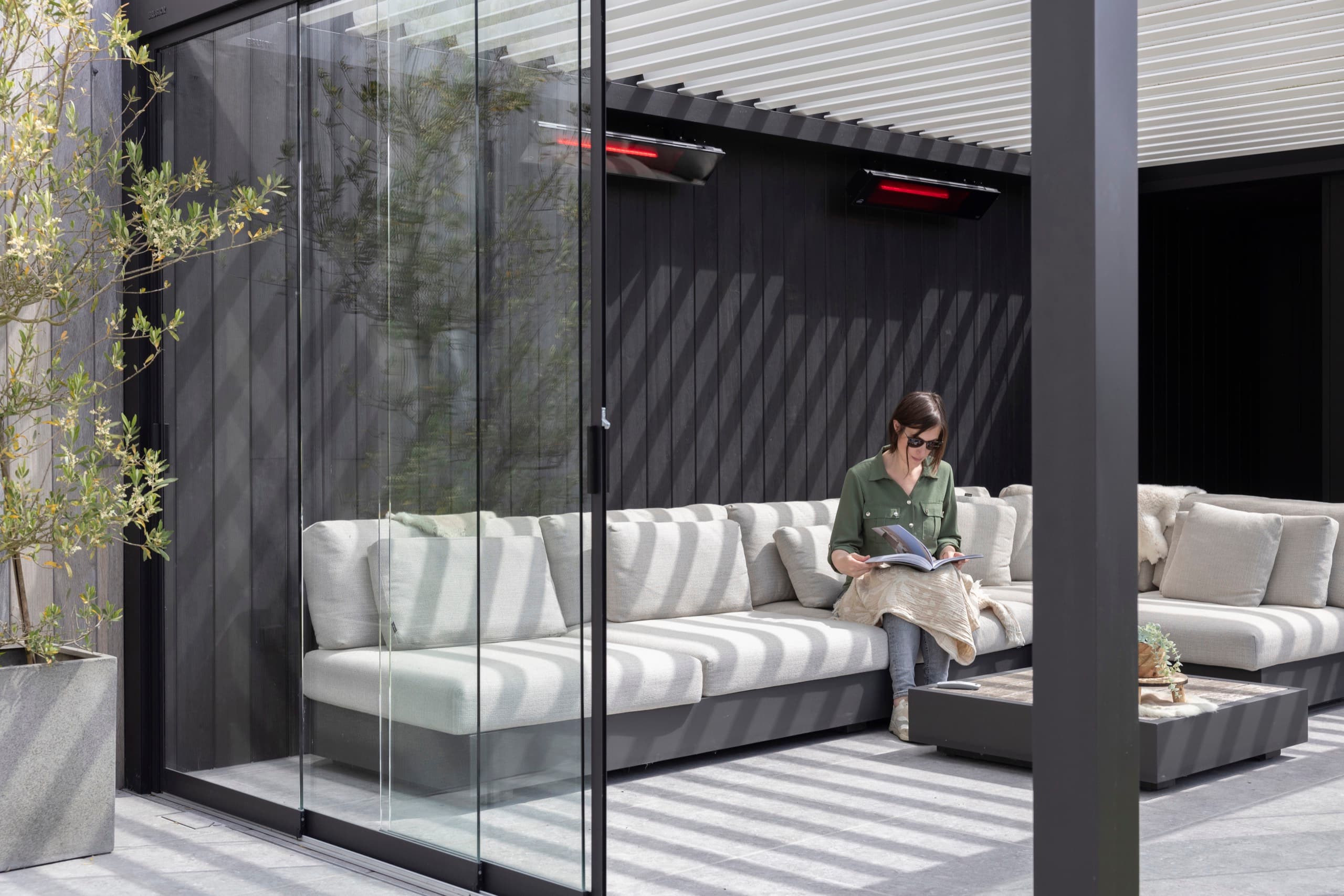 Glass enclosure panels partially open