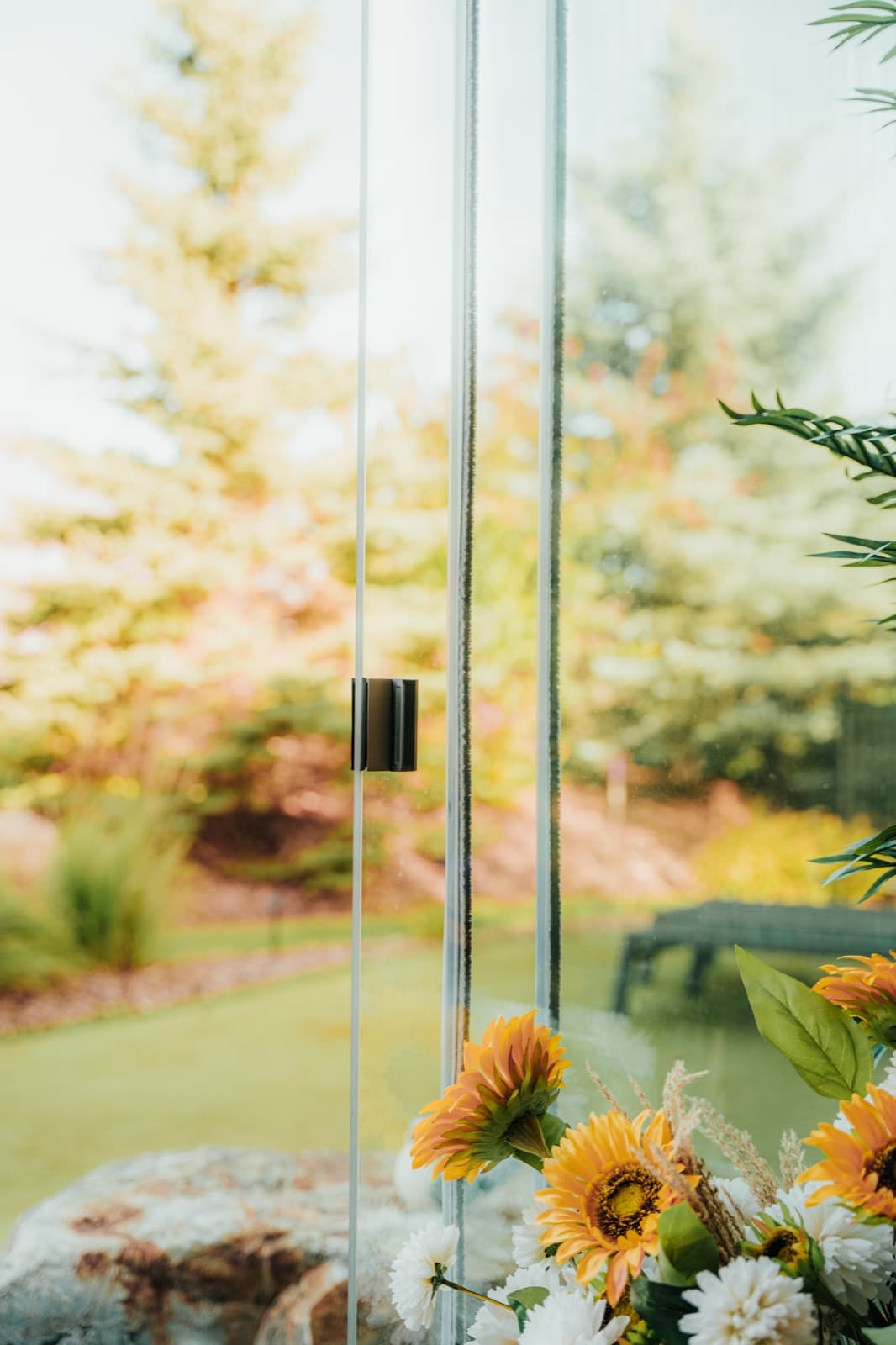 Close-up of Lumon frameless sliding glass panels