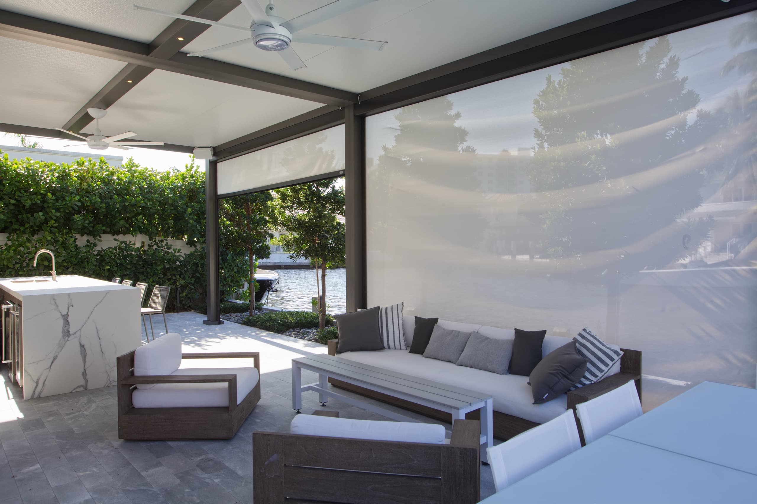 Lanai replacement with modern gray and white louvered roof system