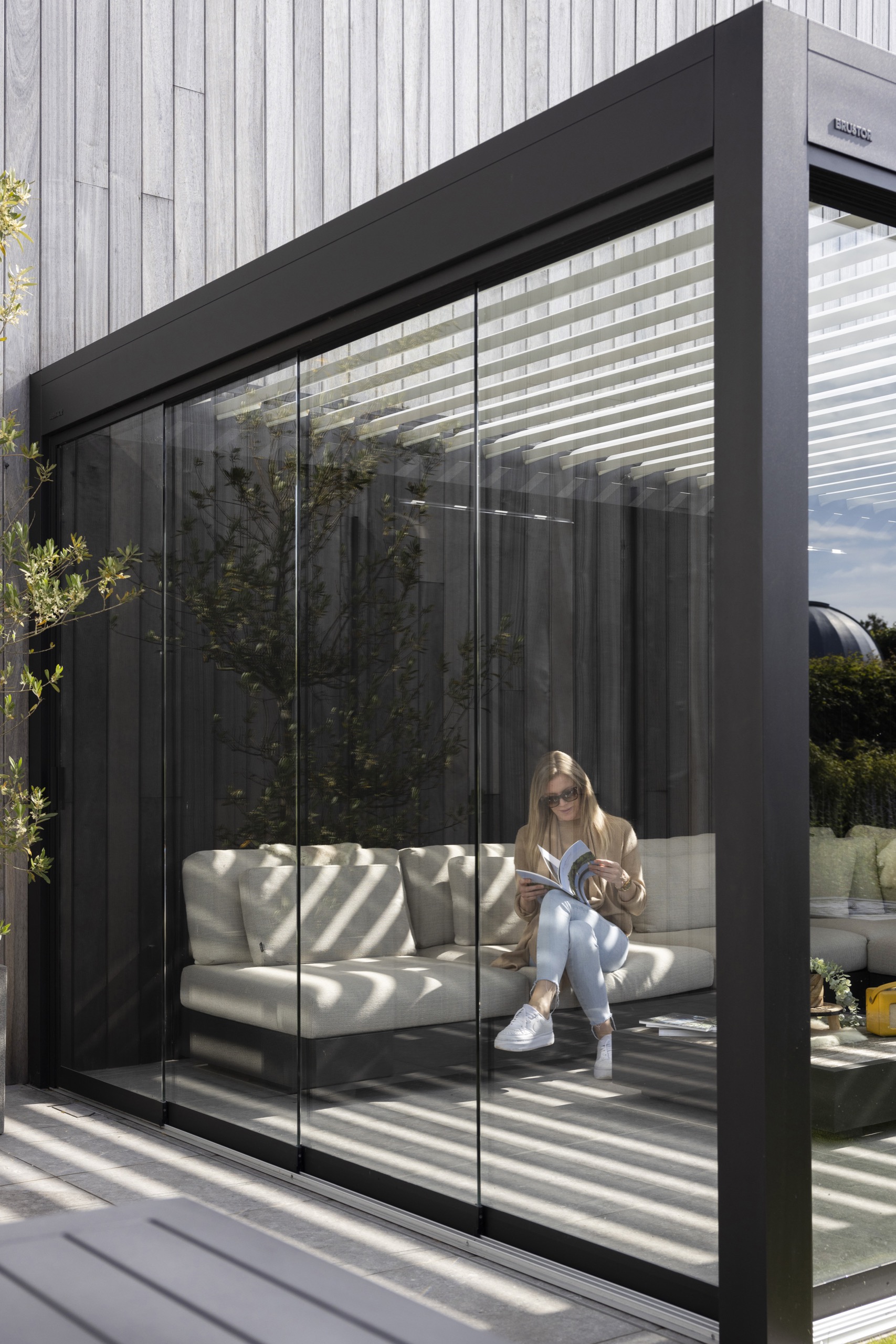 Glass enclosure with closed panels